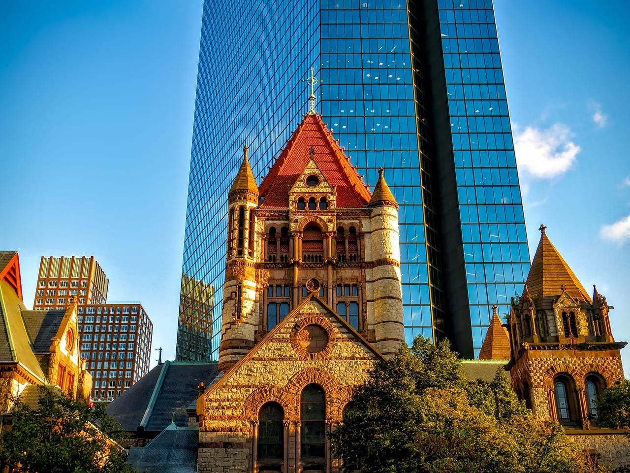 Trinity Church with the shadow of the John Hancock Tower in Boston
