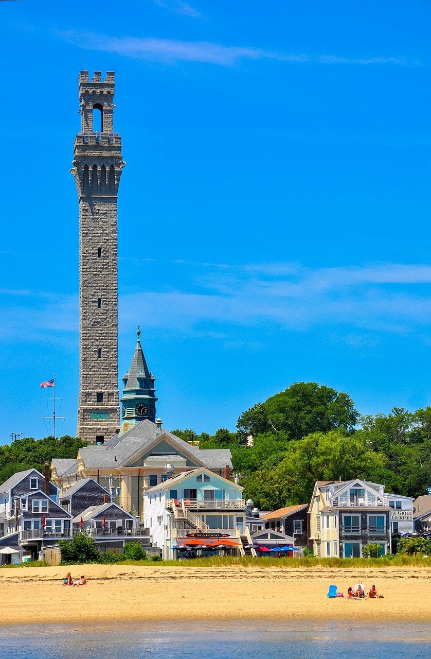 The Pilgrim Monument resembling the Torre del Mangia in Siena, above Provincetown at the tip of the Cape