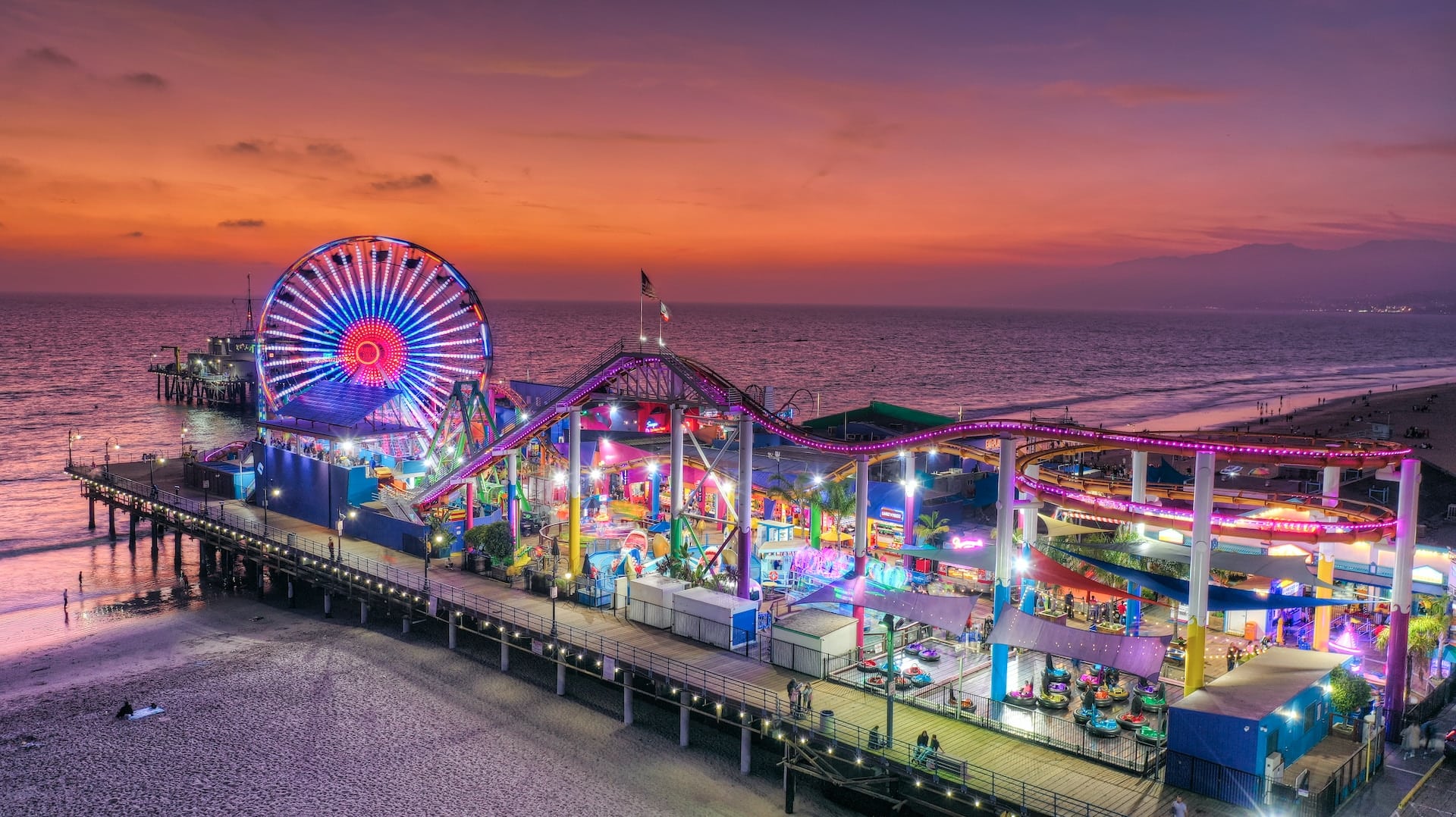 Amusement park and Ferris wheel at Santa Monica Pier