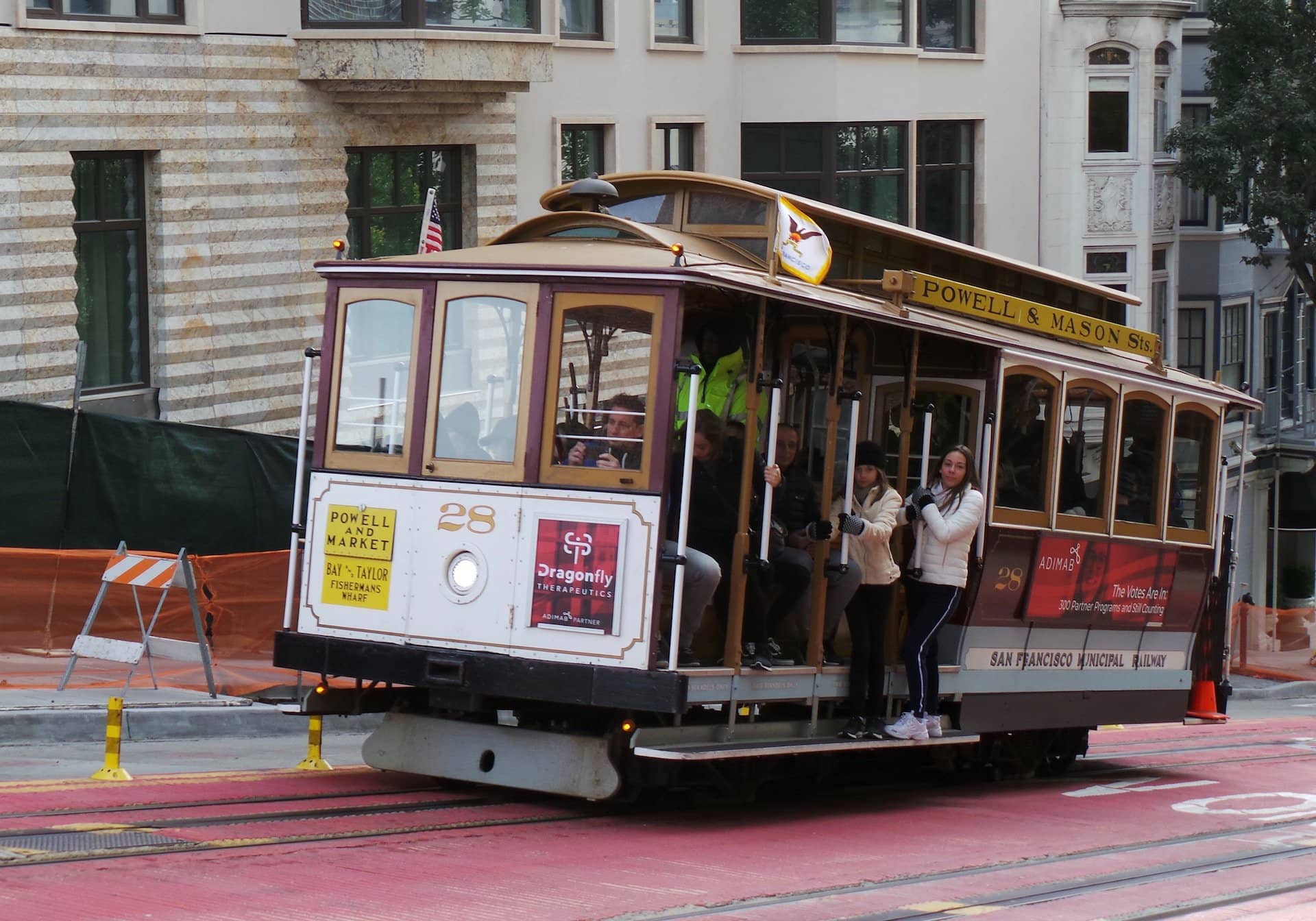 The Powell Street cable car in the streets of San Francisco's Chinatown