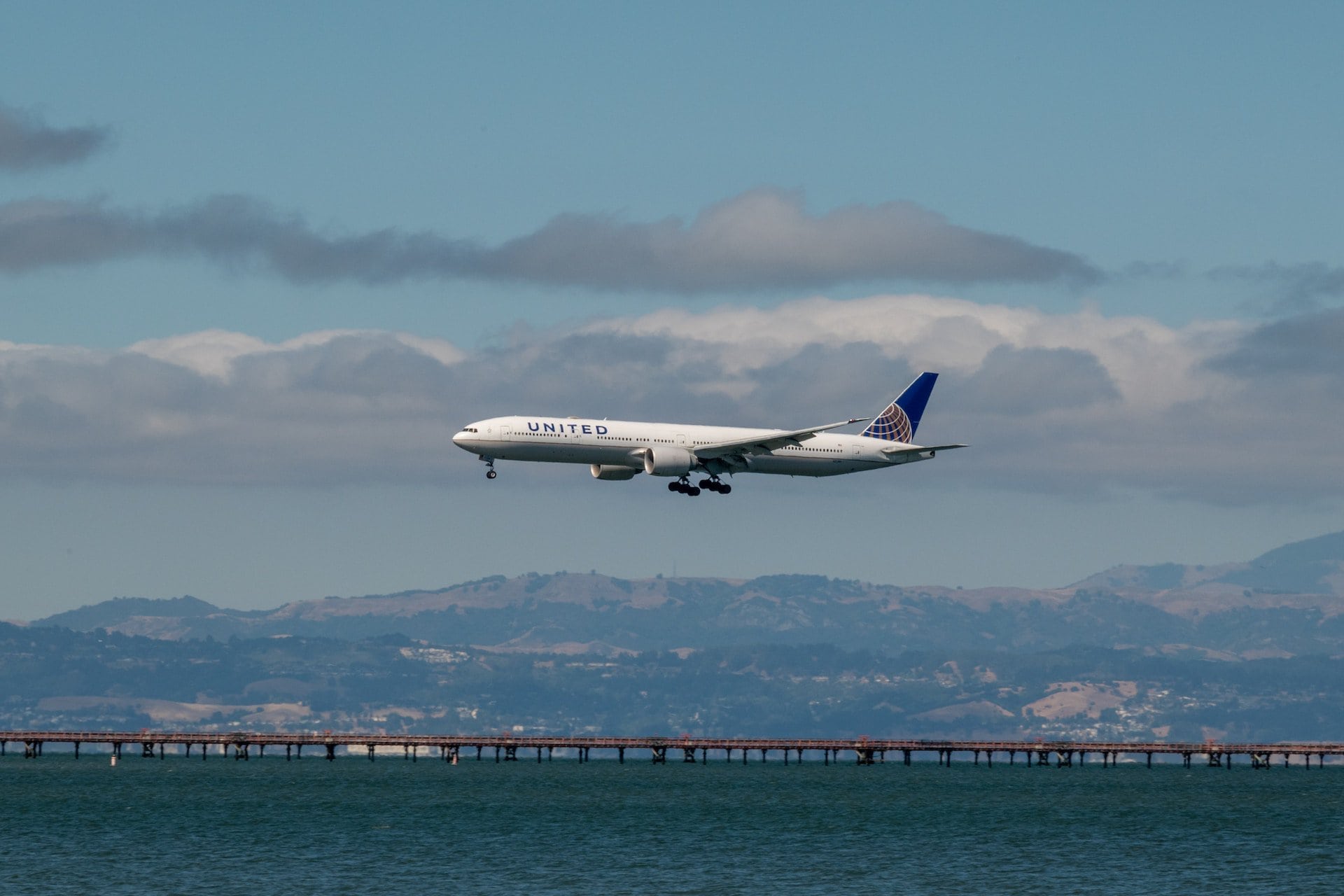 A plane landing at San Francisco International Airport