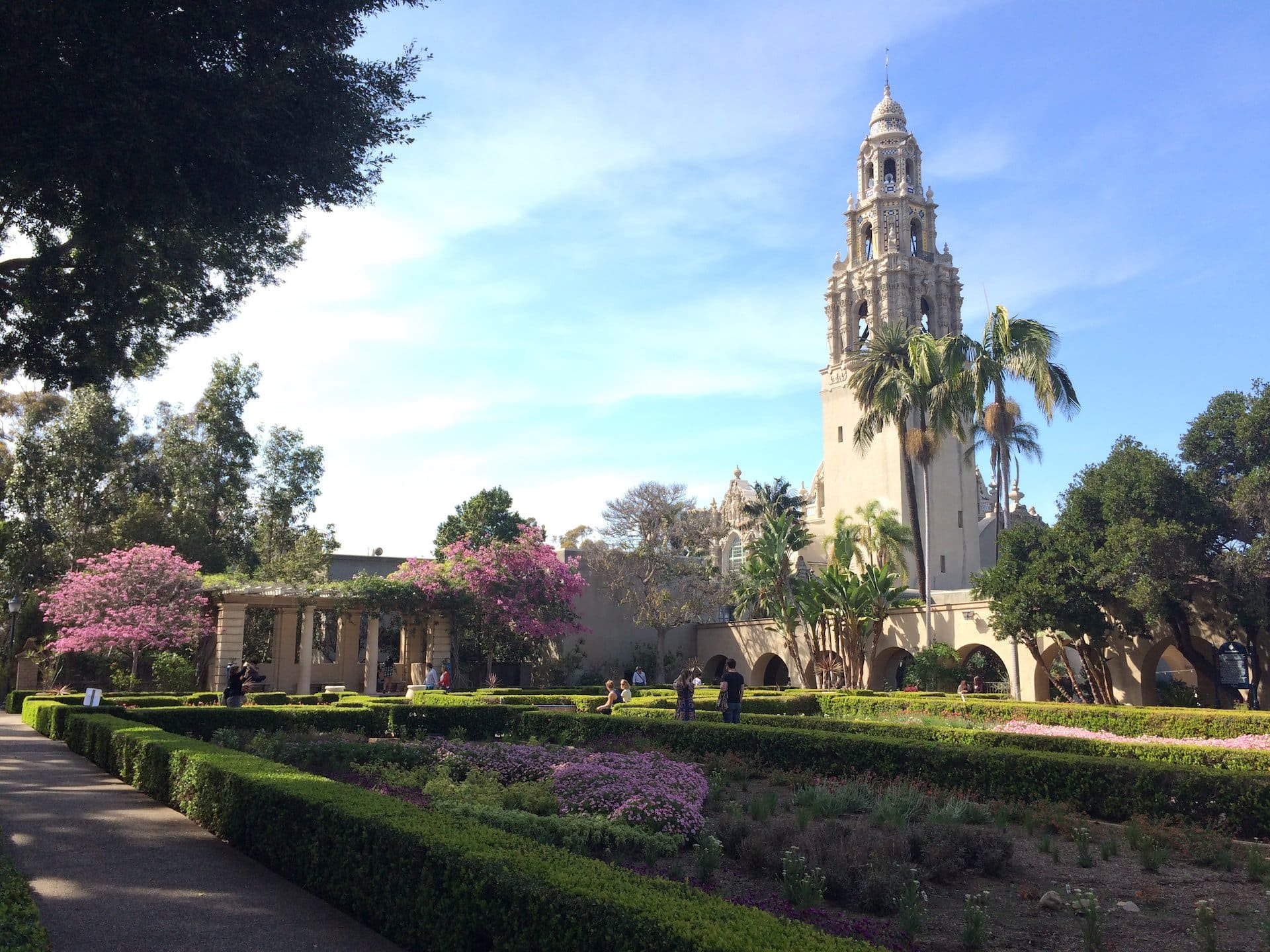The tall bell tower of the Museum of Man and Alcazar Garden in Balboa Park, San Diego