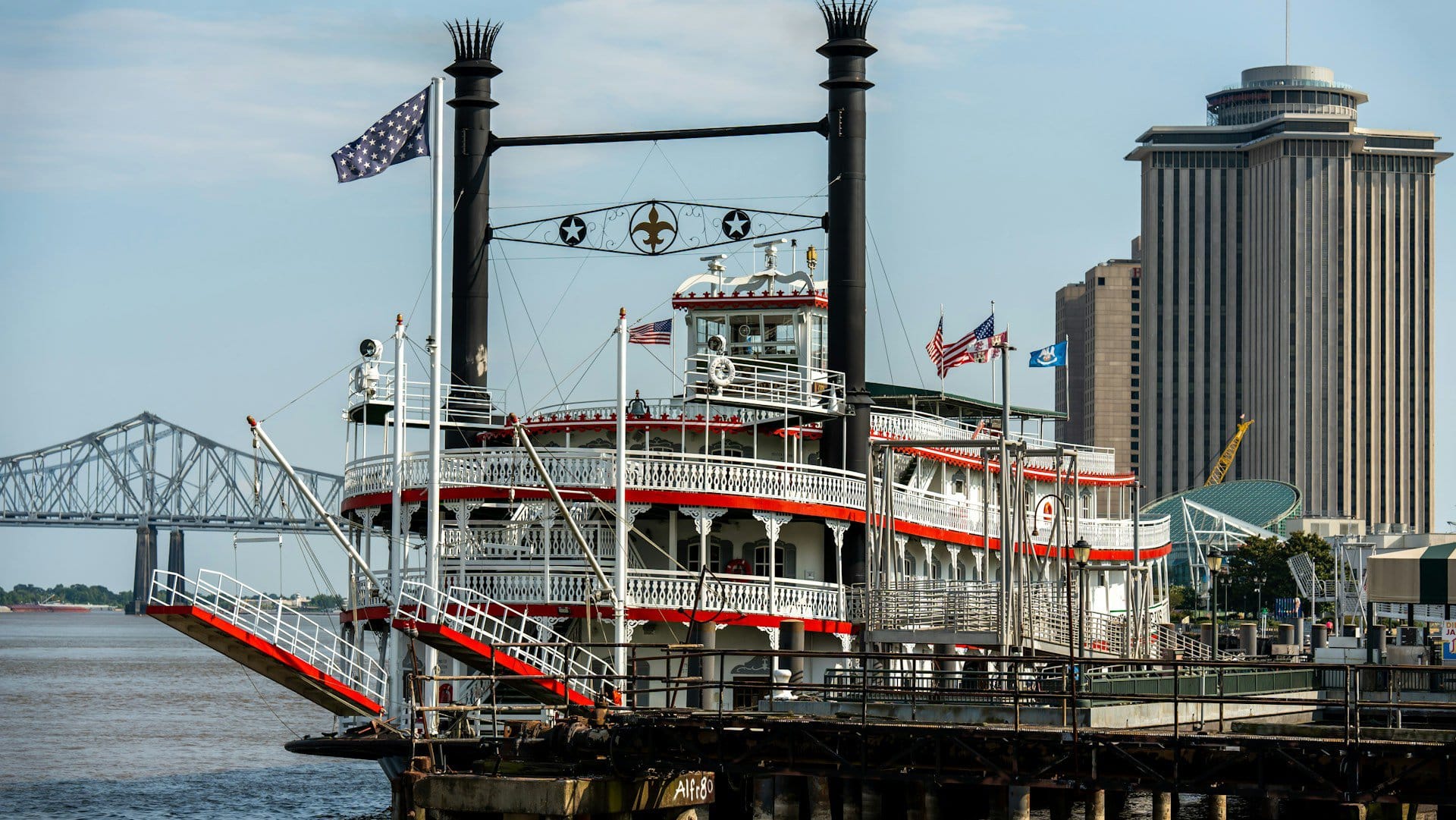 The docking of the steamboat Natchez on the Mississippi River in downtown New Orleans