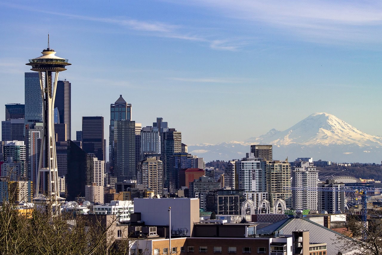 The Space Needle in Seattle and Mount Rainier